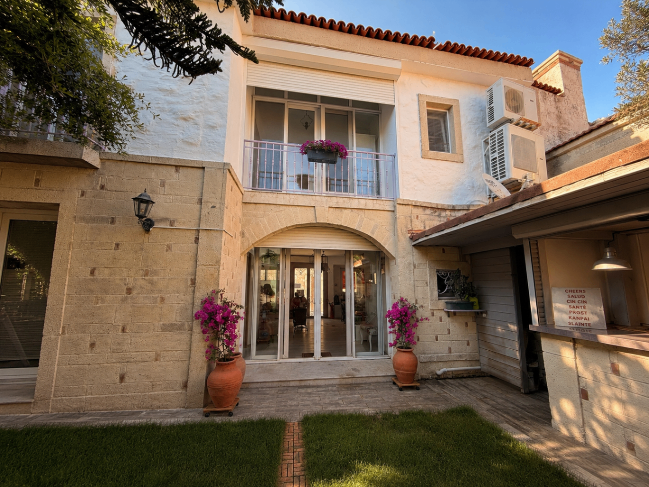 Traditional stone house back garden in Alacati